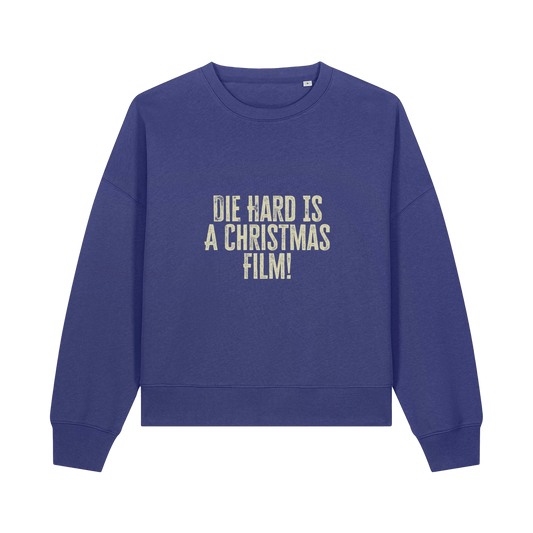 blue christmas jumper with the slogan 'die hard is a christmas film'