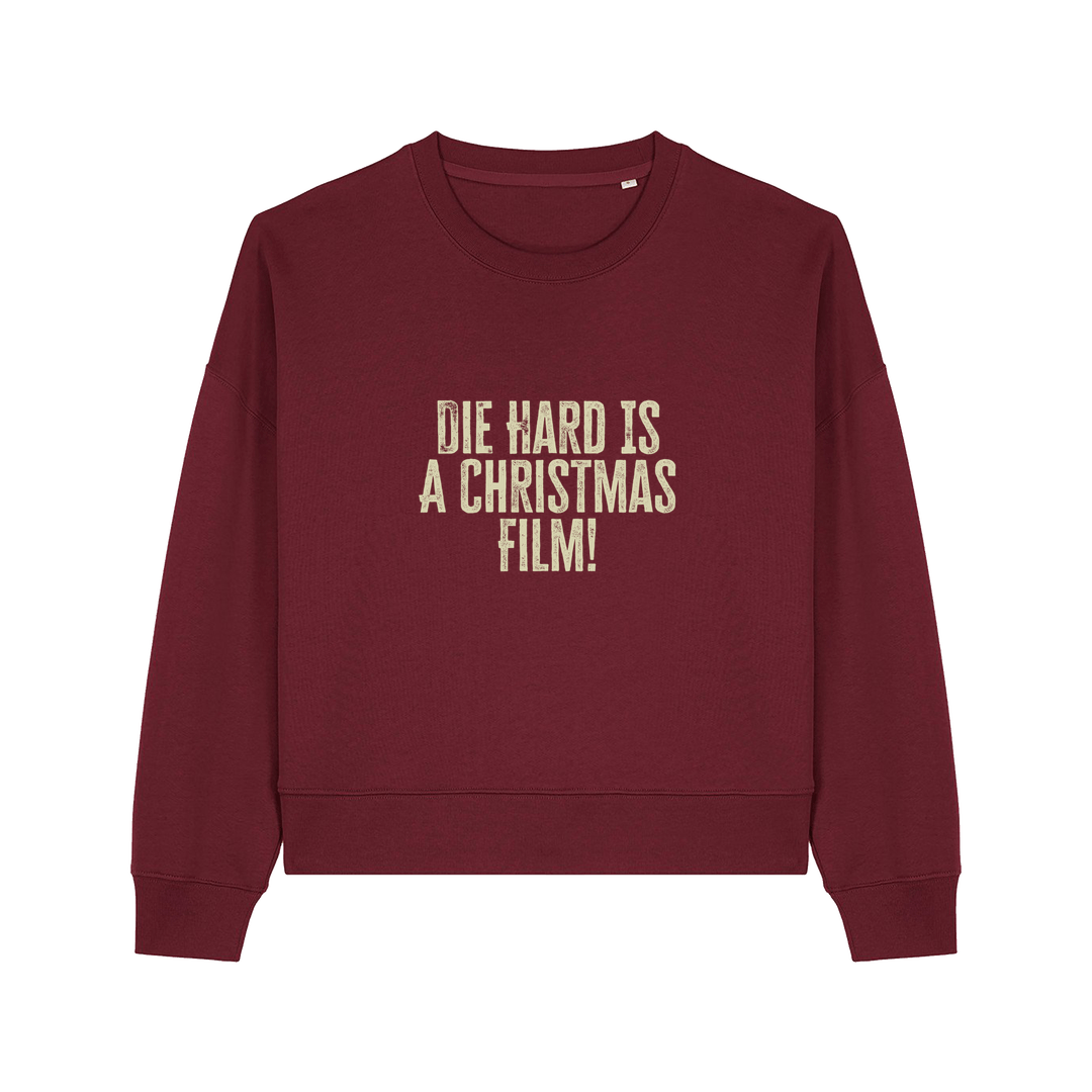 burgundy christmas jumper with the slogan 'die hard is a christmas film'