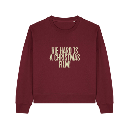 burgundy christmas jumper with the slogan 'die hard is a christmas film'