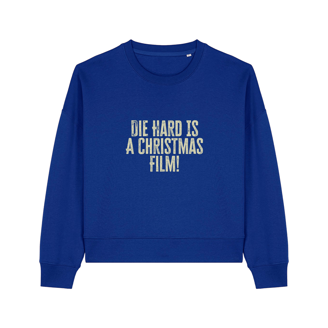 royal blue christmas jumper with the slogan 'die hard is a christmas film'
