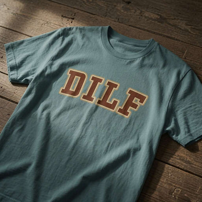 Green bay DILF t-shirt laid on wood, cheeky best husband slogan graphic