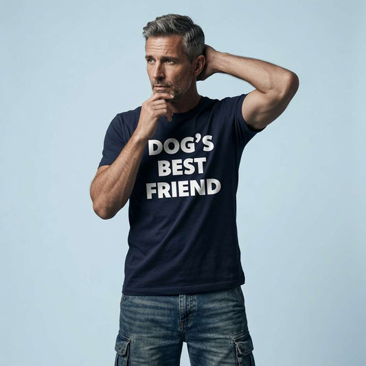 Man posing thoughtfully in french navy Dog’s Best Friend tee, witty dog lover slogan
