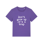 purple funny slogan t-shirt that reads 'don't grow up it's a trap'