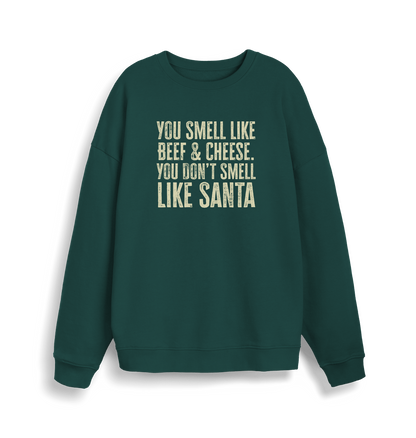 green christmas sweater with the slogan 'you smell like beef and cheese, you dont smell like santa'