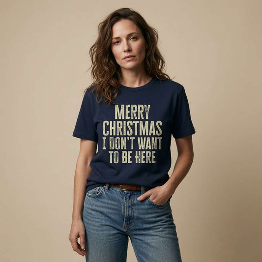 Woman standing with hands in pockets in navy Merry Christmas I Don’t Want To Be Here t-shirt, ladies funny hate xmas statement