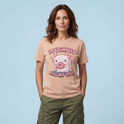 Woman standing with hands in pockets in peach Doughnut Kill My Vibe t-shirt, witty funny axolotl pun