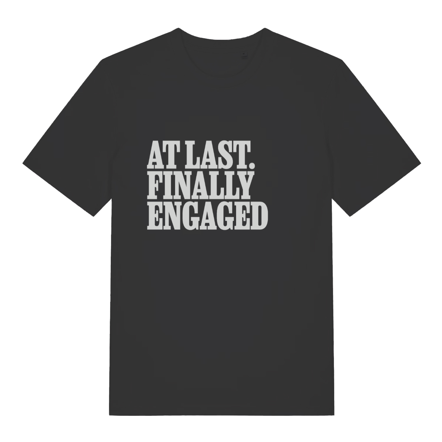 Black women's At Last Finally Engaged T-shirt flat lay with bold white slogan text