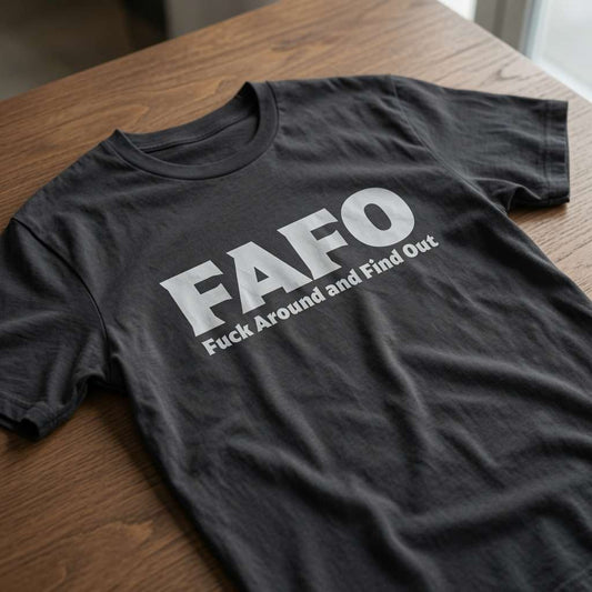 Black FAFO t-shirt on wood with Fuck Around and Find Out text, fun offensive motto mens rude slogan
