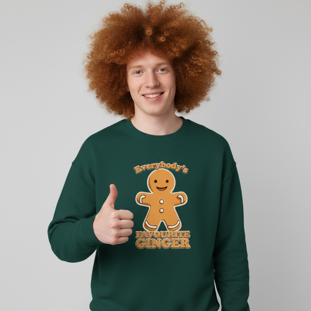 Person wearing a green sweatshirt with a gingerbread man design and text, giving a thumbs up on a gray background
