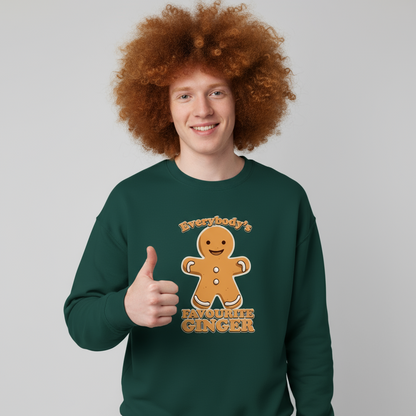 Person wearing a green sweatshirt with a gingerbread man design and text, giving a thumbs up on a gray background