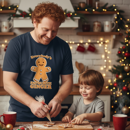 Man and child making gingerbread cookies in a festive kitchen.