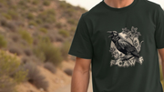 Person wearing a black funny t-shirt with a crow design and 'FCAWF