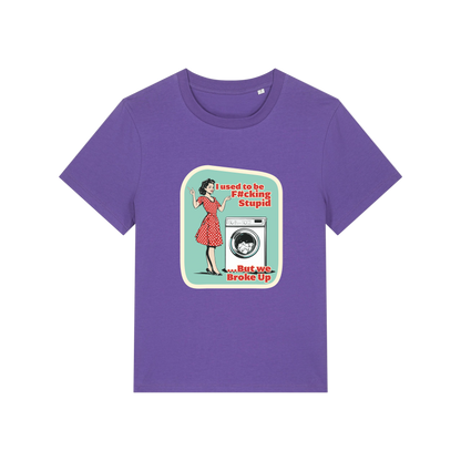 purple funny offensive t-shirt with the graphic of a retro housewife stood next to a washing machine and the slogan 'i used to be fucking stupid .. but we broke up'
