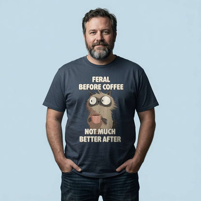 Bearded man with hands in pockets in india ink grey Feral Before Coffee tee, funny witty coffee graphic