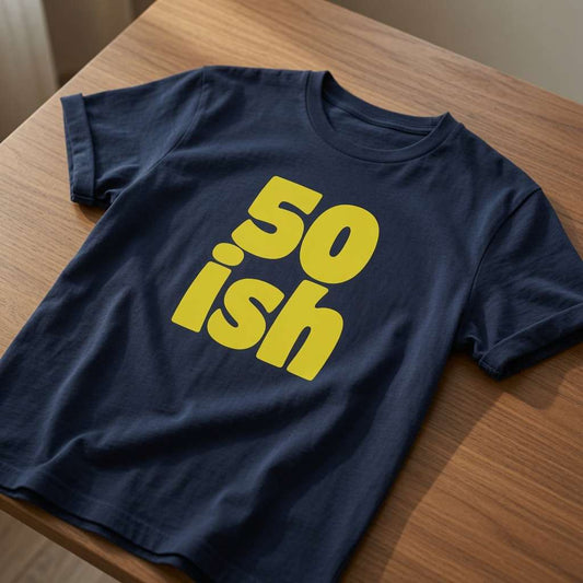 Navy 50 ish t-shirt on wood with bold yellow text, mens fun witty 50 year birthday