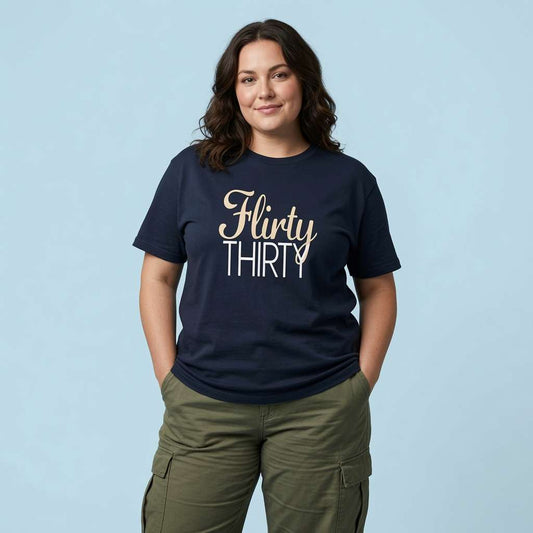 Woman with hands in pockets in french navy Flirty Thirty t-shirt, ladies birthday slogan