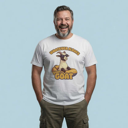 Bearded man laughing with hands in pockets in white Whatever Floats Your Goat t-shirt, funny witty animal pun graphic