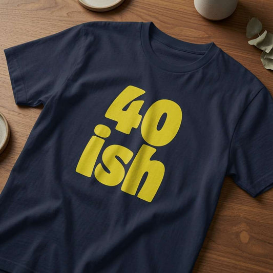 Navy 40 ish t-shirt on wood with bold yellow text, funny mens witty 40th slogan
