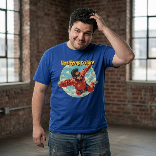 Man with hand in hair in worker blue I’m Free Fallin’ tee, mens 90s music inspired graphic