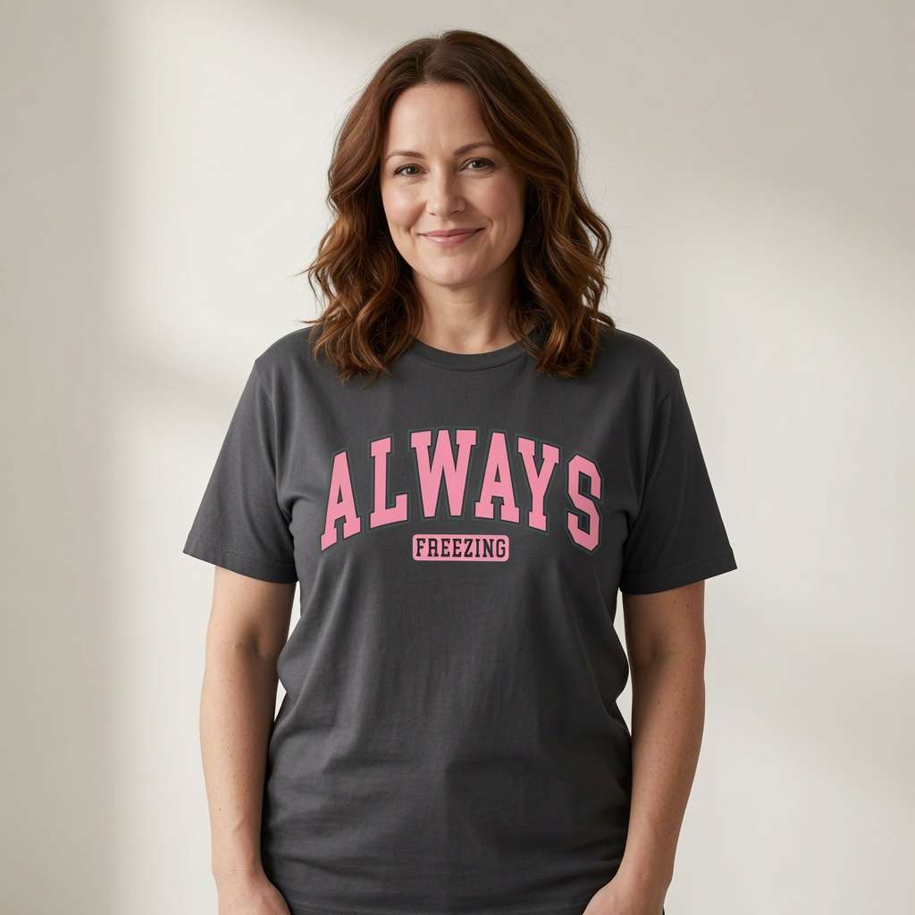 Woman standing in black Always Freezing tee, fun ladies cold slogan