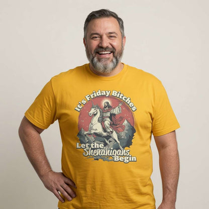 Bearded man laughing with hands on hips in yellow It’s Friday Bitches Let the Shenanigans Begin tee, funny witty mens jesus graphic