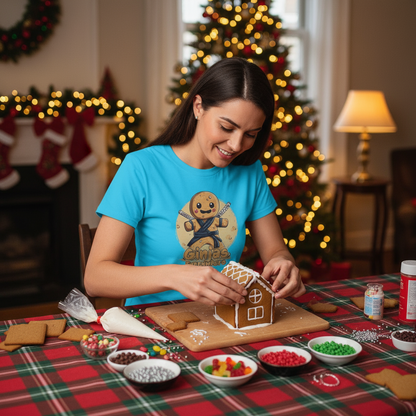 woman in a ginja ninja t-shirt building a gingerbread house