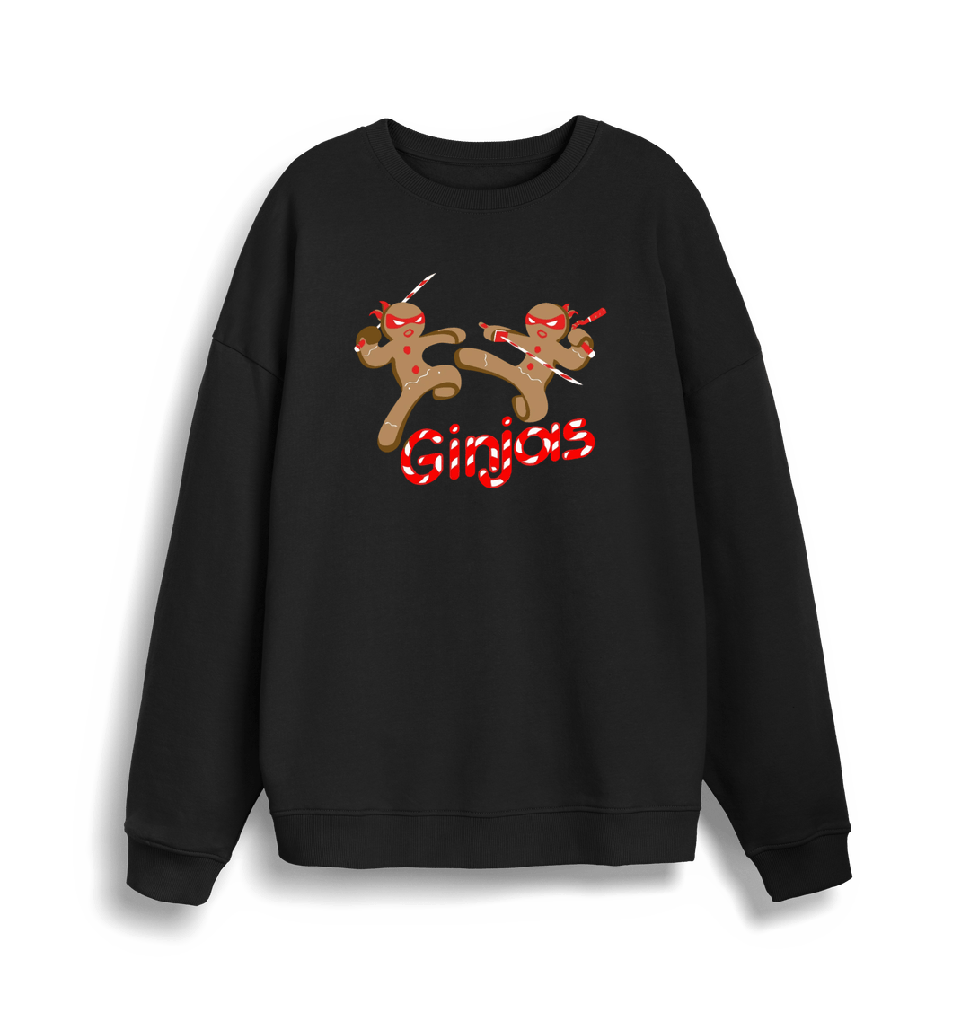 black christmas sweater with the graphic of two gingerbread men fighting with candy canes and the slogan 'ginjas'