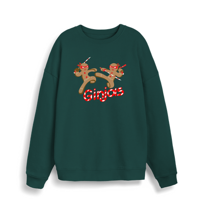 green christmas sweater with the graphic of two gingerbread men fighting with candy canes and the slogan 'ginjas'