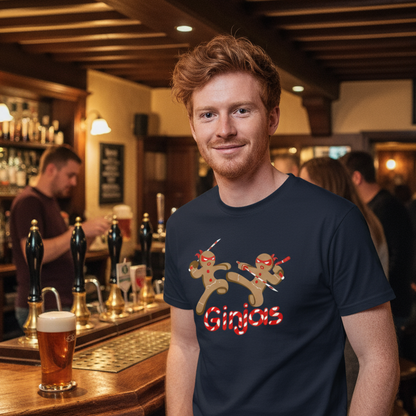 Man wearing a navy blue t-shirt with a graphic design and text in a pub setting