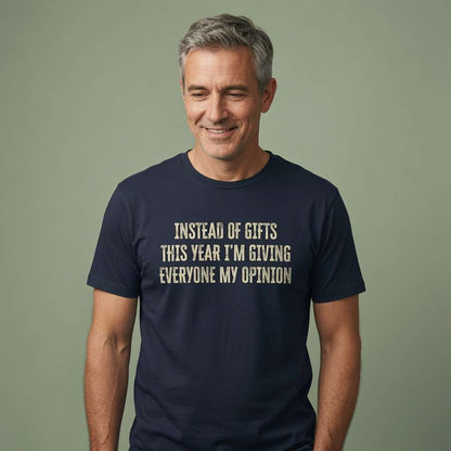 Grey-haired man smiling in navy Instead of Gifts This Year I’m Giving Everyone My Opinion t-shirt, funny mens christmas slogan
