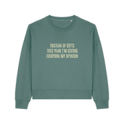 green christmas jumper with the slogan 'instead of giving gifts this year i'm giving everyone my opinion'