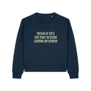 navy christmas jumper with the slogan 'instead of giving gifts this year i'm giving everyone my opinion'