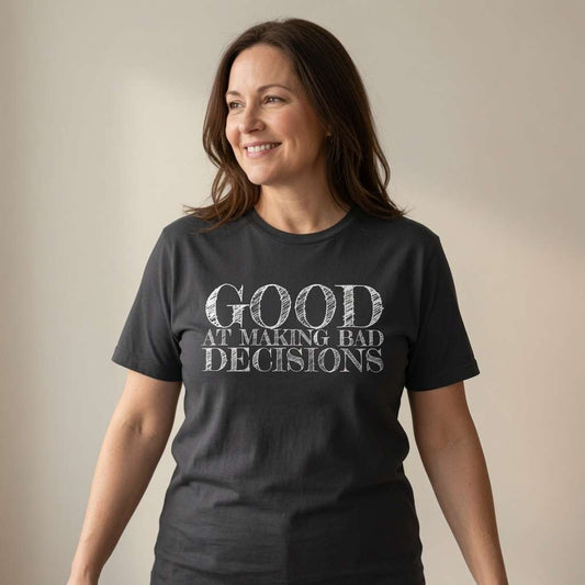 Woman smiling looking to the side in black Good at Making Bad Decisions t-shirt, ladies fun witty slogan