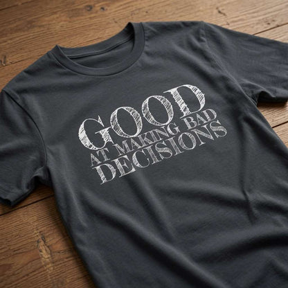 Ink grey Good at Making Bad Decisions t-shirt on wood with chalk-style text, funny relatable ladies slogan