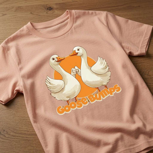 Fraiche peche Goose Bumps t-shirt on wood with fist-bumping geese, witty goose pun graphic