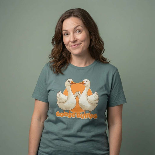Woman with slight smirk in green bay Goose Bumps tee, funny goose pun graphic