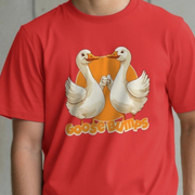 Red silly goose t-shirt with cartoon geese and 'Goose Bumps' slogan on a plain background