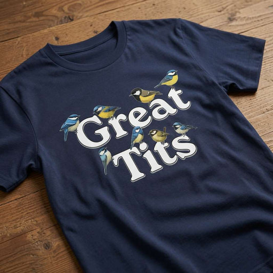 Navy Great Tits t-shirt on wood featuring blue tits and small birds perched on text, funny witty offensive rude bird pun graphic
