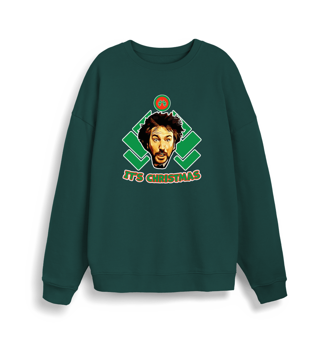 green christmas sweater with a graphic of die hards gruber and the slogan 'it's christmas'