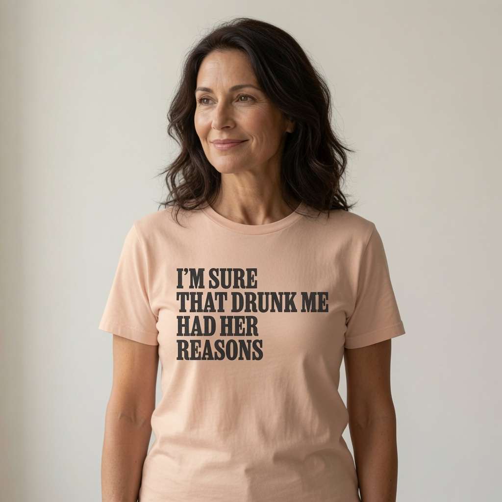 Woman with slight smile looking sideways in fraiche peche I’m Sure That Drunk Me Had Her Reasons t-shirt, ladies pub banter slogan
