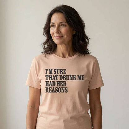 Woman with slight smile looking sideways in fraiche peche I’m Sure That Drunk Me Had Her Reasons t-shirt, ladies pub banter slogan