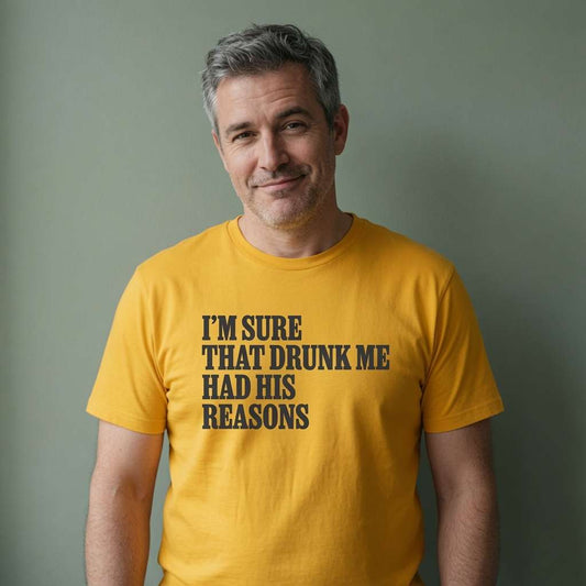 Grey-haired man with slight smile in spectra yellow I’m Sure That Drunk Me Had His Reasons tee, funny witty slogan