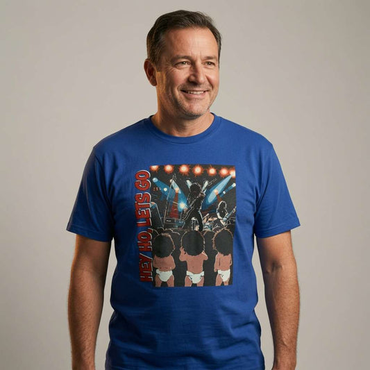 Man smiling in worker blue Hey Ho Let’s Go t-shirt featuring band on stage with babies in diapers, mens music inspired graphic