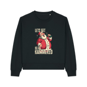 black christmas sweater with the graphic of santa drinking a beer and the slogan 'lets get ho ho hammered'