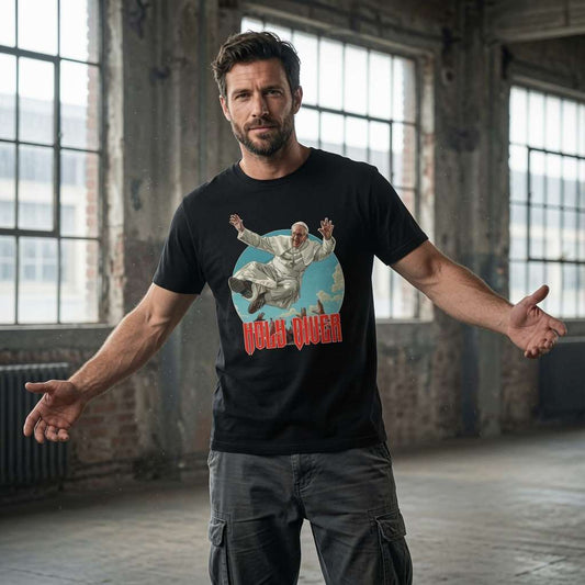 Bearded man with arms out in black Holy Diver tee with flying Pope design, funny mens music inspired graphic