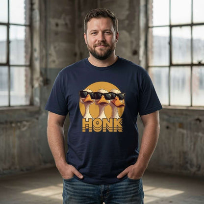 Bearded man hands in pockets in french navy HONK t-shirt, mens cheeky fun goose honk graphic