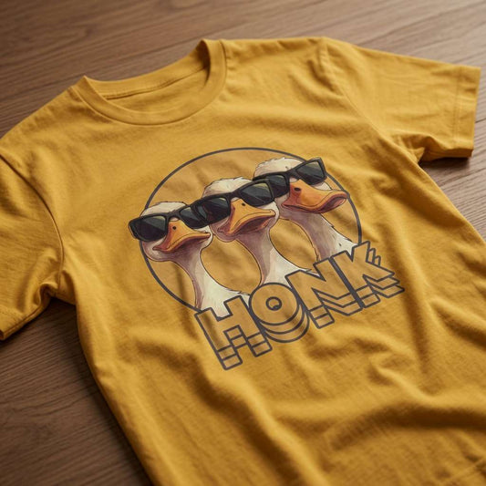 Spectra yellow HONK t-shirt on wood featuring three geese in sunglasses, funny mens honk goose graphic
