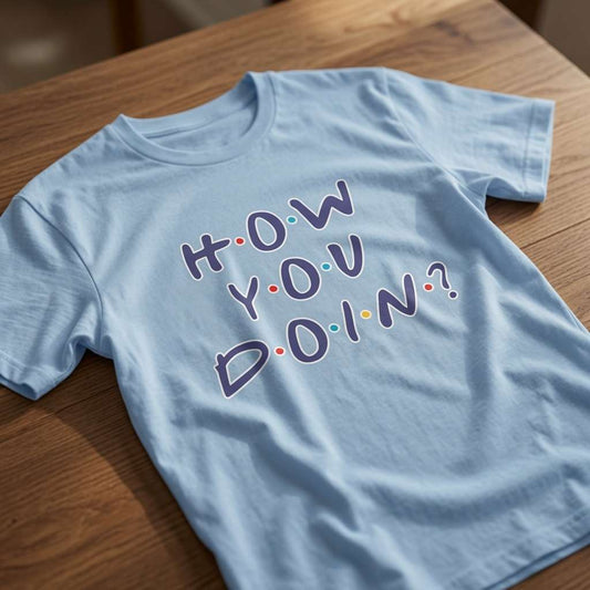Sky blue How You Doin’? t-shirt on wood with Friends-style text, ladies tv slogan for women