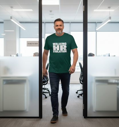 Man wearing a green t-shirt with 'Walking HR Violation' text in an office setting