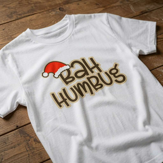 White Bah Humbug t-shirt on wood featuring Santa hat text, funny witty ladies xmas slogan